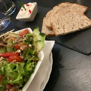 Salad, garlic mayo, bread made on site at Estudio Vegetariano in Lagos
