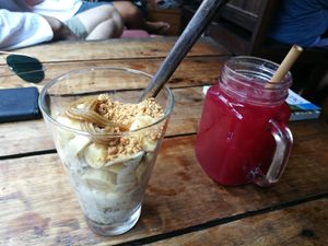 Overnight oats with banana topping. Raw juice. at Coconut Monkey in Koh Tao