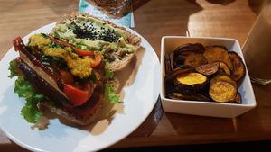 A burger on the menu at The Vegan Temple by Prasada in Cusco