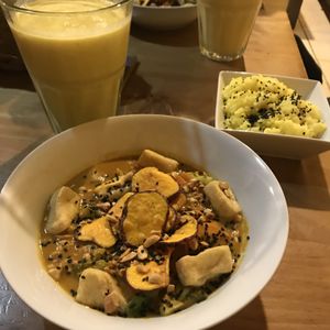 Red curry with veggies and fried tofu (so fresh and delicious flavour) rice and la paz lassi (the size of the glass is HUGE and ideal for 2 people) at The Vegan Temple by Prasada in Cusco