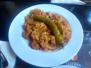Fried cabbage with a sour dressing at Taverna Sarbului in Sinaia