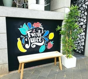 sign outside at SAP Bagel & Juice Bar - Stationsstraat in Maastricht