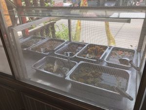 Screened in buffet options but you can order from kitchen made to order at Sai Than Boon in Phuket