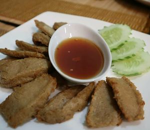 Crispy fried faux pork with sweet chilli dipping sauce. Very delicious at Sai Than Boon in Phuket