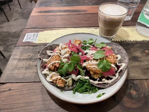 Jackfruit tacos & coffee latte  at Positive Deli - Rue de Satory in Versailles