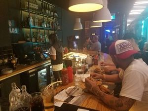 eating at bar  at Bar Vegandale in Toronto