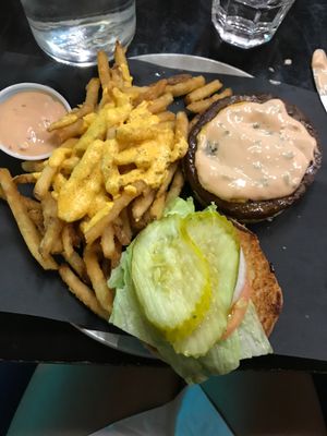 classic burger with cheese fries. Tasted just like meat ?  at Bar Vegandale in Toronto