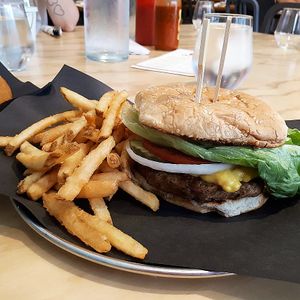 Classic burger with fries. at Bar Vegandale in Toronto