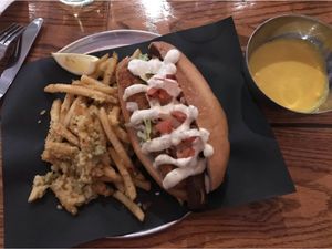Chickn and bacon burger with aioli. Garlic fries!  at Bar Vegandale in Toronto
