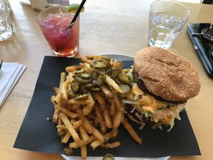 Big Mac with spicy fries  at Bar Vegandale in Toronto