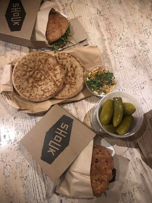 Our order, with Israeli pickles at Shouk in Washington