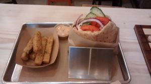 Cucumber-hummus pita and polenta fries at Shouk in Washington