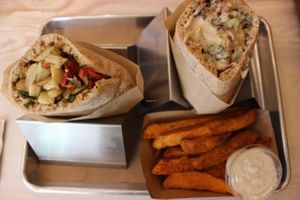 Cauliflower pita, Fennel pita, Sweet potato fries and cashew labneh at Shouk in Washington