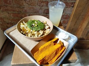 fennel bowl with sweet potato fries and lavender lemonade at Shouk in Washington