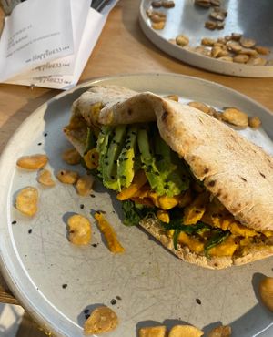 vegan green chicken flatbread   at The Happiness Cafe  in Eindhoven