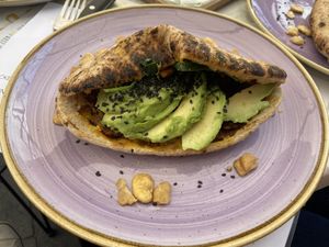 Vegan chicken flatbread (recommended, really filling)  at The Happiness Cafe  in Eindhoven