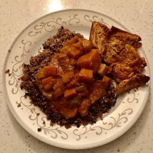 takeaway coconut curry on super grains with bbq tofu  at Urban Herbivore - Kensington Market in Toronto