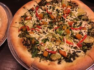 seasonal butternut squash pizza they have a giant list of vegan pizzas available at all times make sure to look for the print out version of the menu before you order at Blind Lady Ale House in San Diego