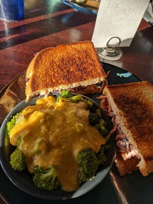 Hot Seitan Sandwich with a side of Broccoli at Graze in Nashville