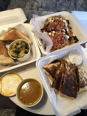A feast of food. Tostadas, quesadilla, soup, sub with side of cheesy broccoli   at Graze in Nashville