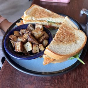 tofu chicken club sandwich with potatoes  at Graze in Nashville