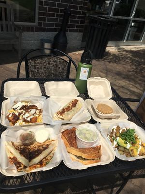 Hot tempeh mac n cheese, chorizo con papas, oatmeal creme pie, buffalo chicken quesadilla, patty melt, and loaded potatoes. at Graze in Nashville