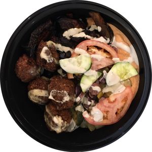 Bowl with falafel, hummus, and veggies--very filling. at The Hummus and Pita Co in New York City