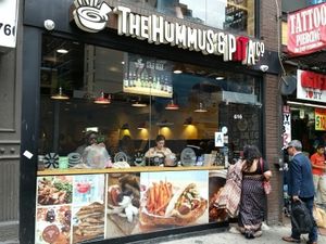 outside at The Hummus and Pita Co in New York City