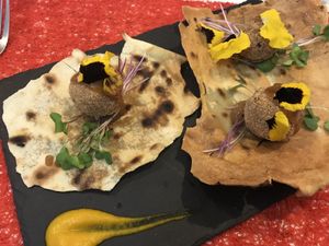 Lentil croquettes on Sardinian bread at Dolmen Bar in Lanzarote