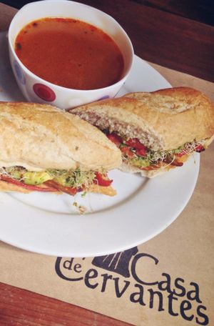 Vegan sandwich: roasted red pepper, organic tomato, alfalfa, avocado, pesto, homemade red pepper hummus, olive oil at La Casa de Cervantes in Guatemala City