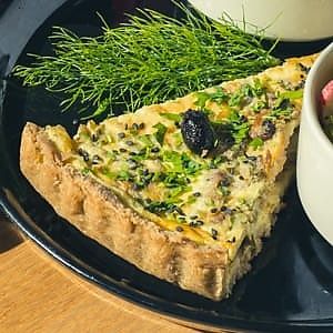 VEGETABLE QUICHE

Vegetable quiche served with green salad and quinoa Tabbouleh
 at Ayaso Restaurant in Marrakech