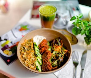 FALAFELS
Served  with raw cabbage, carrots, grated turnips and fresh goat cheese sauce.
 at Ayaso Restaurant in Marrakech