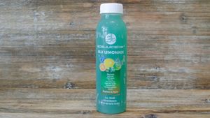 Blu Lemonade made lemon juice, lime juice, sour OJ, organic blue spirulina, cayenne, infused basil and peppermint, organic agave, filtered water. at SpaJuiceBar in Fort Lauderdale