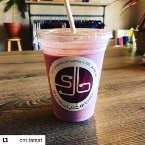 Feel Me Up smoothie- almond milk, coconut meat, strawberry, banana, chia seed, hempseed, vanilla.  So delicious it's scandalous.  at SpaJuiceBar in Fort Lauderdale
