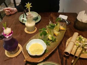 Mango avocado rolls, durian smoothie and purple cabbage juice at Uu Dam Chay in Hanoi