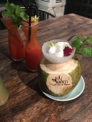 Vegan sushi, vegan main (platter), fresh coconut and orange juice with ginger ale. at Uu Dam Chay in Hanoi