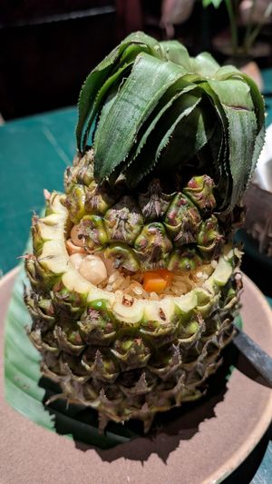 Macadamia fried rice in a pineapple at Uu Dam Chay in Hanoi