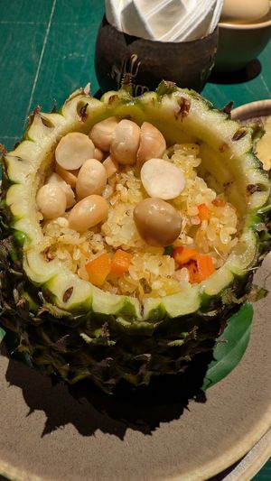 Macadamia fried rice in a pineapple at Uu Dam Chay in Hanoi