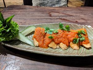 Tofu dish with tomato sauch - tasty! at Uu Dam Chay in Hanoi