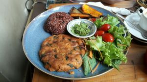 black bean red rice tofu cake at Om Hanoi in Hanoi
