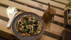 pesto pizza and pumpkin smoothie at Om Hanoi in Hanoi