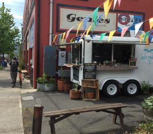 Store and adjacent food cart at Genies Cafe in Portland