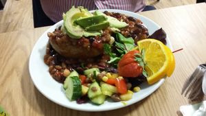 Vegan meal at Perrylicious - a baked potato with beans and avocado. at PerryLicious Coffee and Cake Rooms in Teignmouth