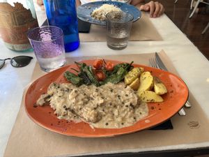 Seitán a la pimienta y rissoto de fondo  at 269 Gastro Vegan in Salamanca