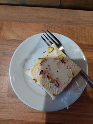 Carrot cake (the thick layer of cream cheese icing   at 3 Three's Coffee Lounge in Birmingham