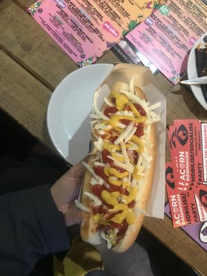 The vegan hotdog. It was not prepared it was supposed to be because the place was so busy. You can see the cheese was not melted and the veggies were raw in it at 3 Three's Coffee Lounge in Birmingham