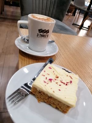 Carrot cake and chai tea latte at 3 Three's Coffee Lounge in Birmingham