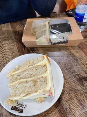 Lemon cake slice, and in box; another lemon slice, brownie and coconut square  at 3 Three's Coffee Lounge in Birmingham