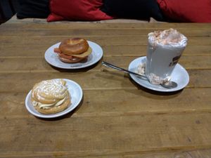 Stacker bagel (vegan chicken & bacon with cream cheese & hot sauce), vegan Viennese swirl & vegan hot chocolate with whipped cream and marshmallows at 3 Three's Coffee Lounge in Birmingham