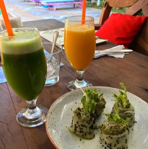 Fresh juices and daikon pesto rolls. at Greenlight Cafe & Bar in Koh Samui